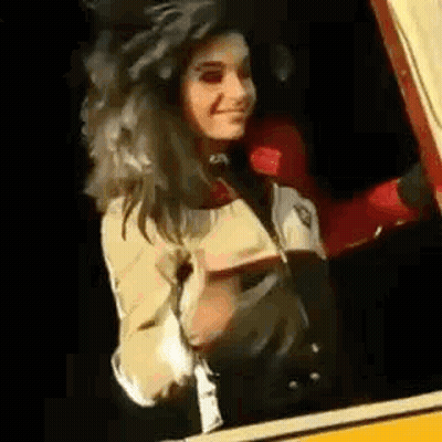 Woman Standing In Car Looking Out GIF