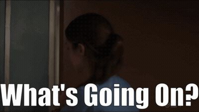 Woman Standing In Dark Room With What GIF