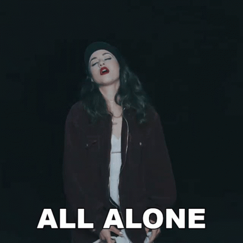 Woman Standing In Darkness All Alone GIF