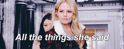 Woman Standing In Front Of Building Saying All The Things She Said GIF