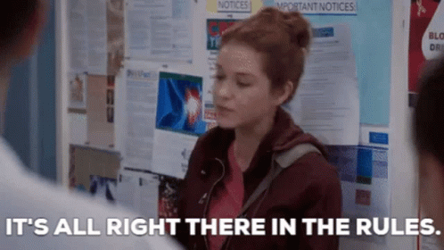 Woman Standing In Front Of Bulletin Board GIF