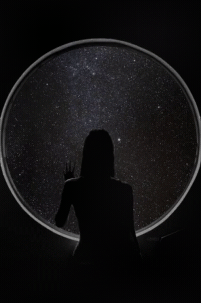 Woman Standing In Front Of Circle Of Stars GIF