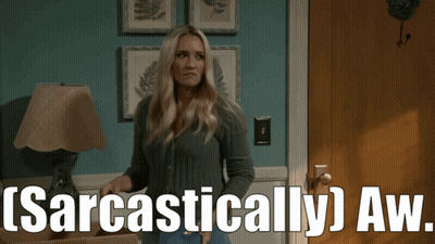 Woman Standing In Front Of Door Saying Aw GIF
