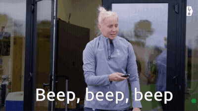 Woman Standing In Front Of Door Saying Beep Beep Beep GIF