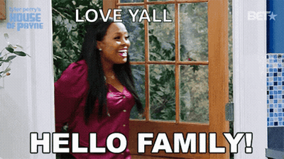 Woman Standing In Front Of Door Saying Love Yall Hello Family GIF