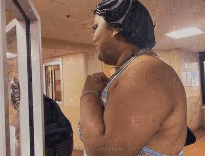 Woman Standing In Front Of Door Saying Natasha Henson GIF