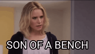 Woman Standing In Front Of Door Saying Son Of A Bench GIF
