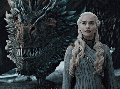 Woman Standing In Front Of Dragon With Sharp Teeth GIF