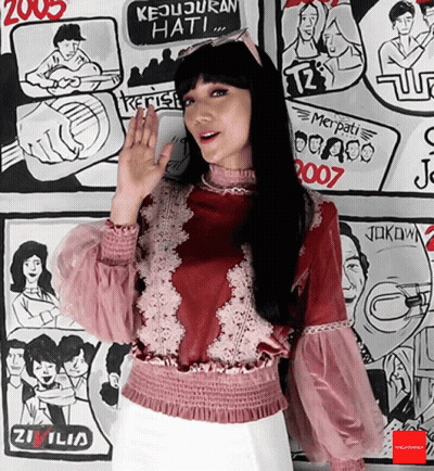 Woman Standing In Front Of Drawings 2007 GIF