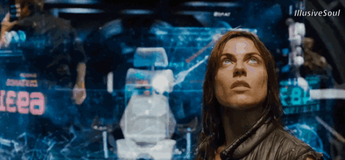 Woman Standing In Front Of Eeea Screen GIF