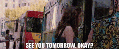 Woman Standing In Front Of Food Truck Saying See You Tomorrow GIF