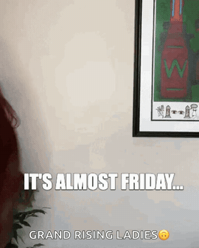 Woman Standing In Front Of Framed Picture Saying It's Almost Friday GIF