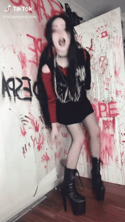 Woman Standing In Front Of Graffiti Wall 1923 GIF