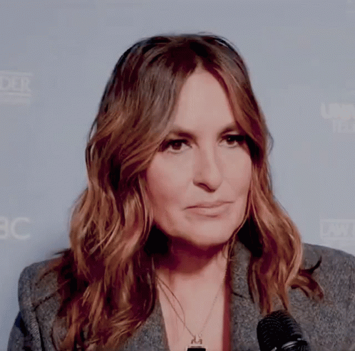 Woman Standing In Front Of Microphone GIF