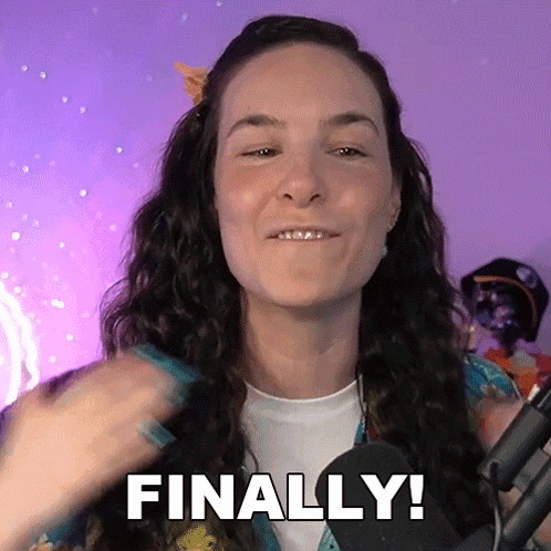 Woman Standing In Front Of Microphone Saying Finally GIF