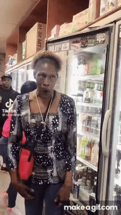 Woman Standing In Front Of Mojito Fridge GIF