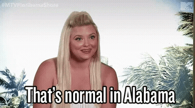 Woman Standing In Front Of Palm Trees Saying That's Normal In Alabama GIF