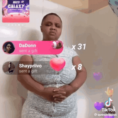 Woman Standing In Front Of Pico Galaxy Sign GIF