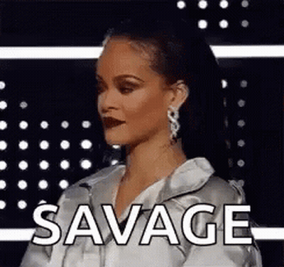 Woman Standing In Front Of Savage Text GIF