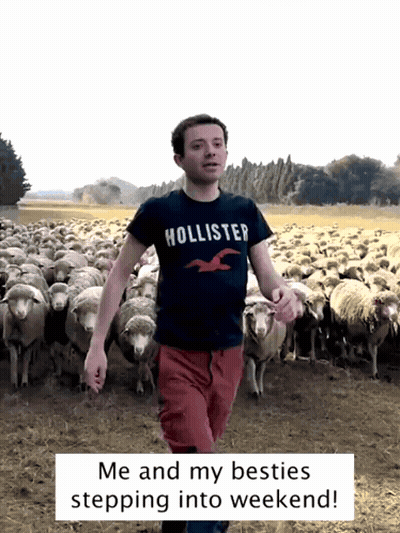 Woman Standing In Front Of Shirt Display GIF