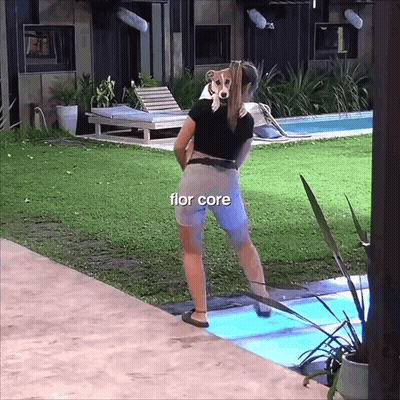 Woman Standing in Front of Swimming Pool With Flor Core