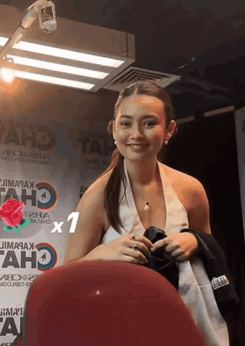 Woman Standing In Front Of Taho Sign GIF