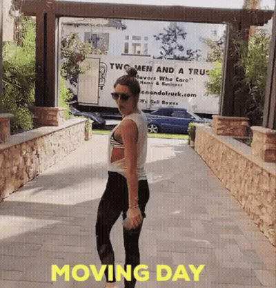 Woman Standing In Front Of Two Men And A Truck GIF