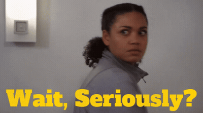 Woman Standing In Front Of Wait Seriously Wall GIF