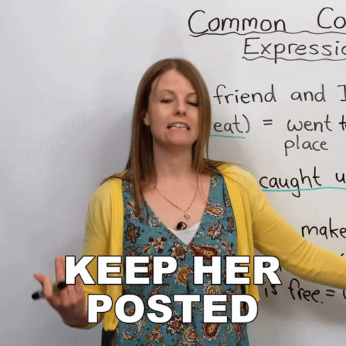 Woman Standing In Front Of Whiteboard Keep Her Posted GIF