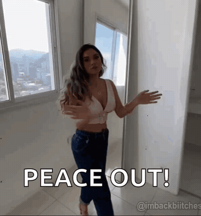 Woman Standing In Front Of Window Peace Out GIF