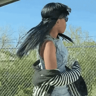 Woman Standing In Front Of Window With #Uploadtv GIF