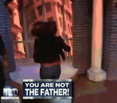 Woman Standing In Front Of You Are Not The Father Sign GIF