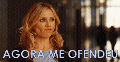 Woman Standing In Hallway With Offended Face GIF