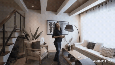 Woman Standing In Living Room GIF
