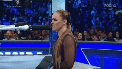 Woman Standing In Smackdown Ring GIF