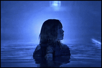 Woman Standing In Water With Ghost GIF