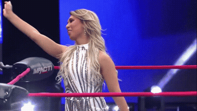 Woman Standing In Wrestling Ring Impact GIF