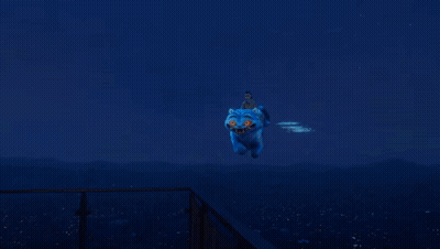 Woman Standing Next To Blue Cartoon Cat GIF
