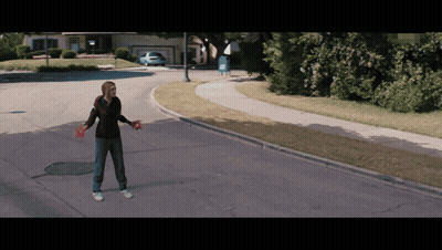 Woman Standing On Road With Arms Outstretched GIF