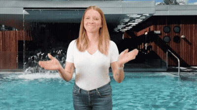 Woman Standing With Arms Outstretched GIF