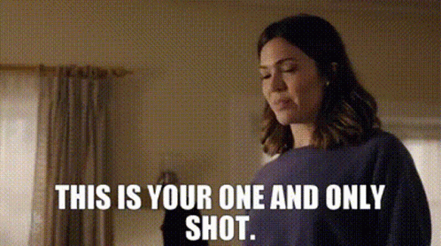 Woman Standing With One Shot Text GIF
