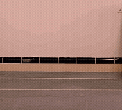 Woman Sticking Head Out Of Sink Surprised GIF