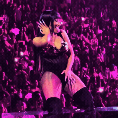 Woman Sticking Tongue Out Dancing In Crowd GIF