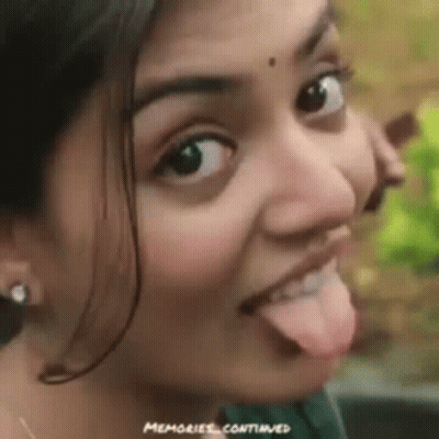 Woman Sticking Tongue Out Funny Face GIF