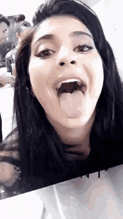 Woman Sticking Tongue Out GIF