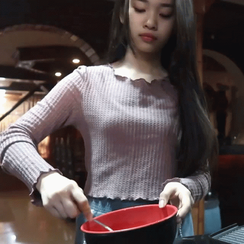 Woman Stirring Bowl With Fork GIF