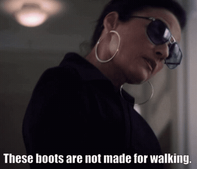 Woman Sunglasses Hoop Earrings These Boots Not Made For Walking GIF