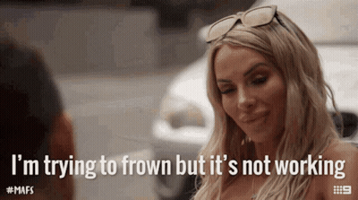 Woman Sunglasses Trying To Frown But Not Working GIF