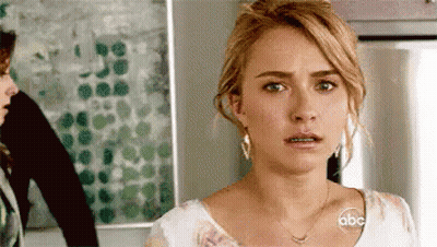 Woman Surprised Face In Kitchen GIF