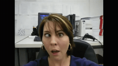 Woman Surprised Sitting At Dell Computer GIF